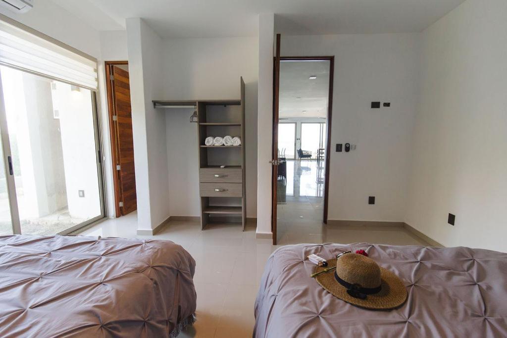 Angelina 28 Beachfront And Family Apartments - Modern And Relaxing Long Stays - 20 Min From Cancun Airport 莫雷洛斯港 外观 照片